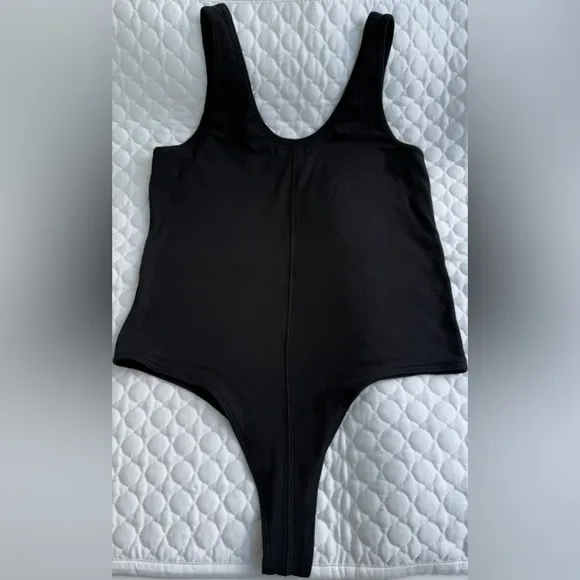 ATM Black Bodysuit One Piece with High-Cut Leg Openings