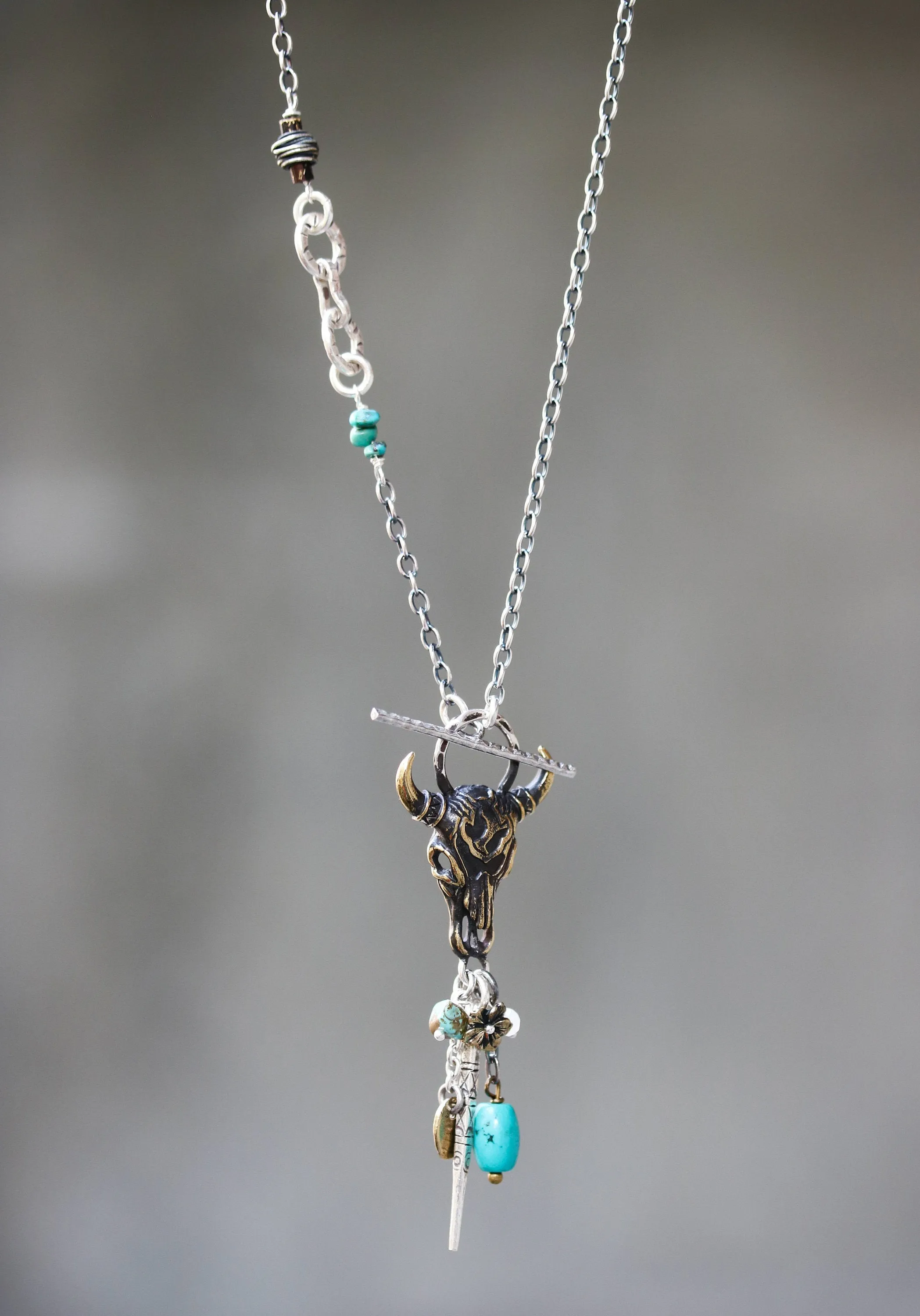 Brass Buffalo shape pendant necklace and turquoise gemstone set with 3 circle silver ring secondary on oxidized sterling silver chain