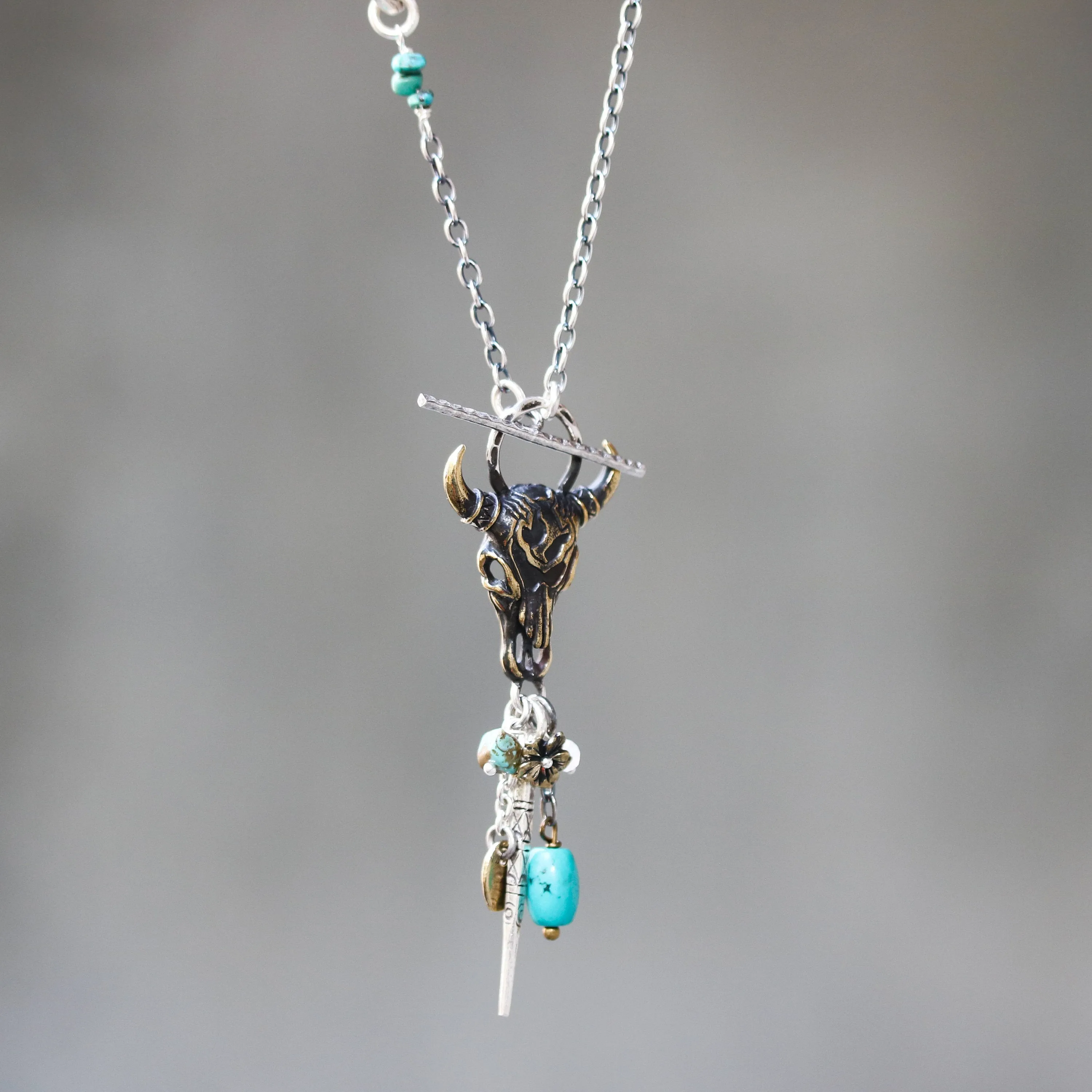 Brass Buffalo shape pendant necklace and turquoise gemstone set with 3 circle silver ring secondary on oxidized sterling silver chain