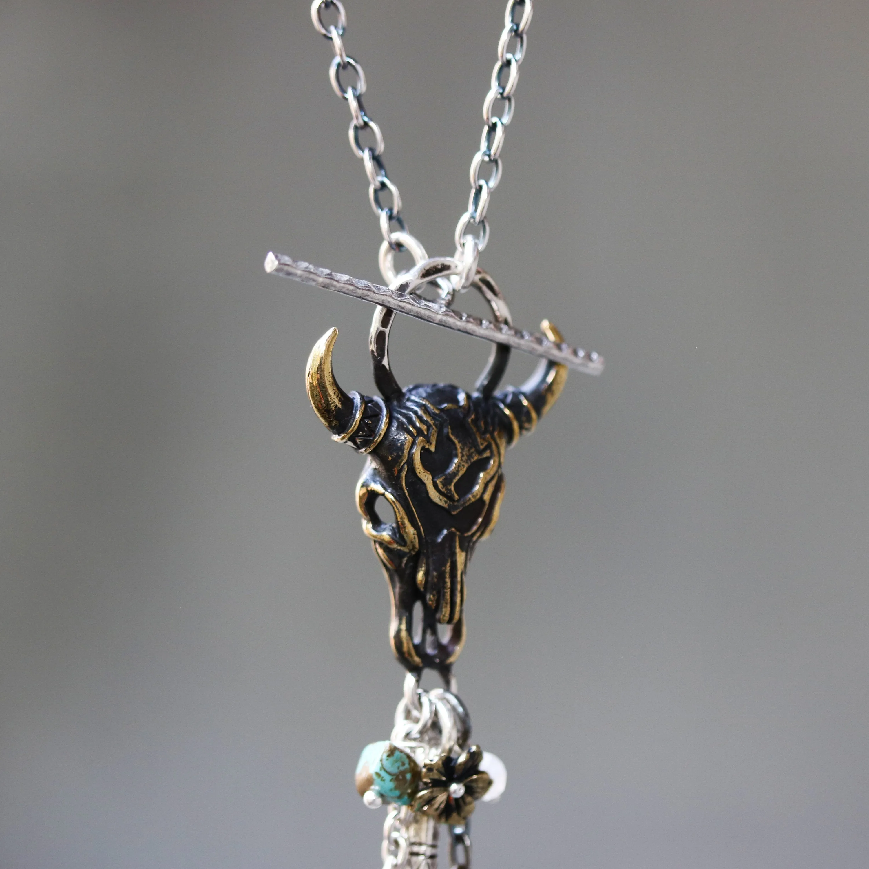 Brass Buffalo shape pendant necklace and turquoise gemstone set with 3 circle silver ring secondary on oxidized sterling silver chain