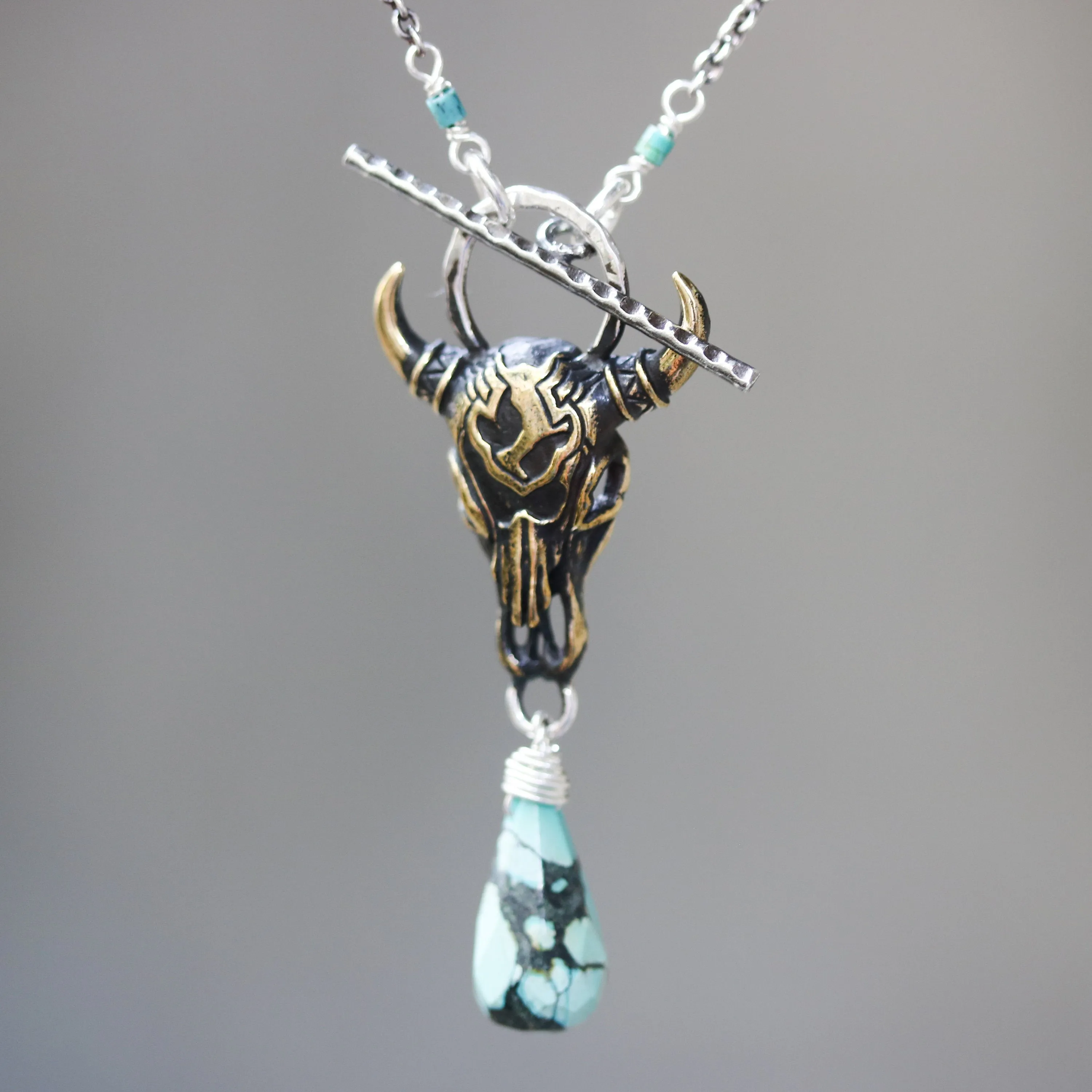 Brass Buffalo shape pendant necklace and turquoise gemstone with turquoise beads and silver ring secondary on sterling silver chain