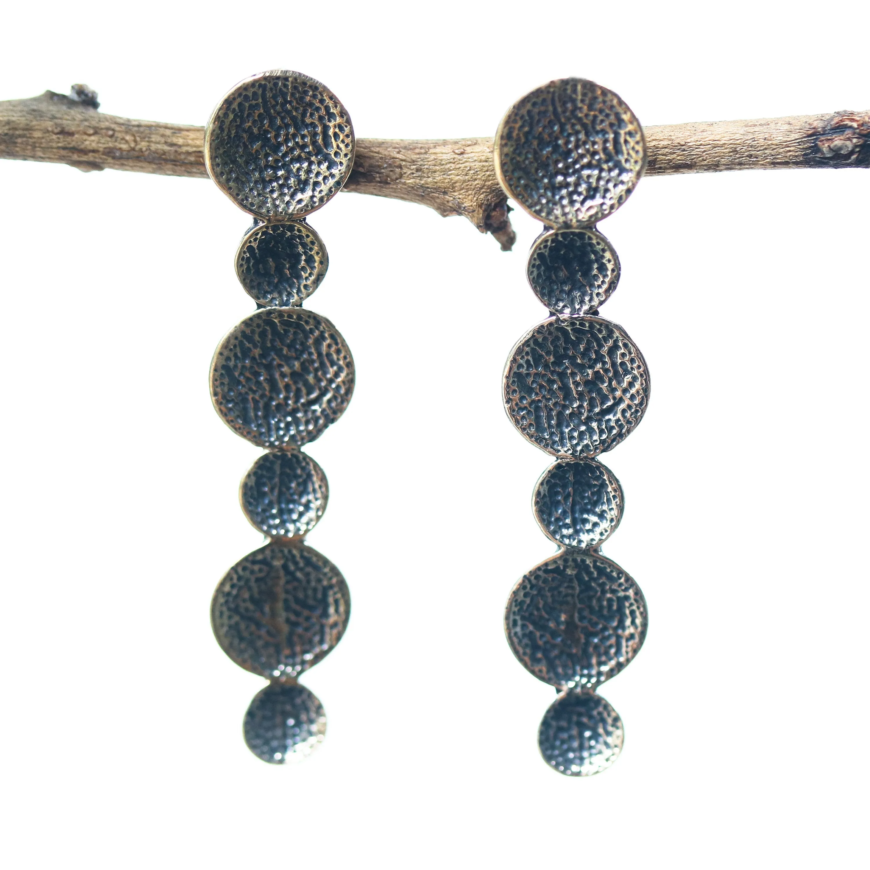 Brass circle earrings with texture oxidized on sterling silver post style