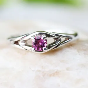 Faceted pink tourmaline gemstone ring with sterling silver band