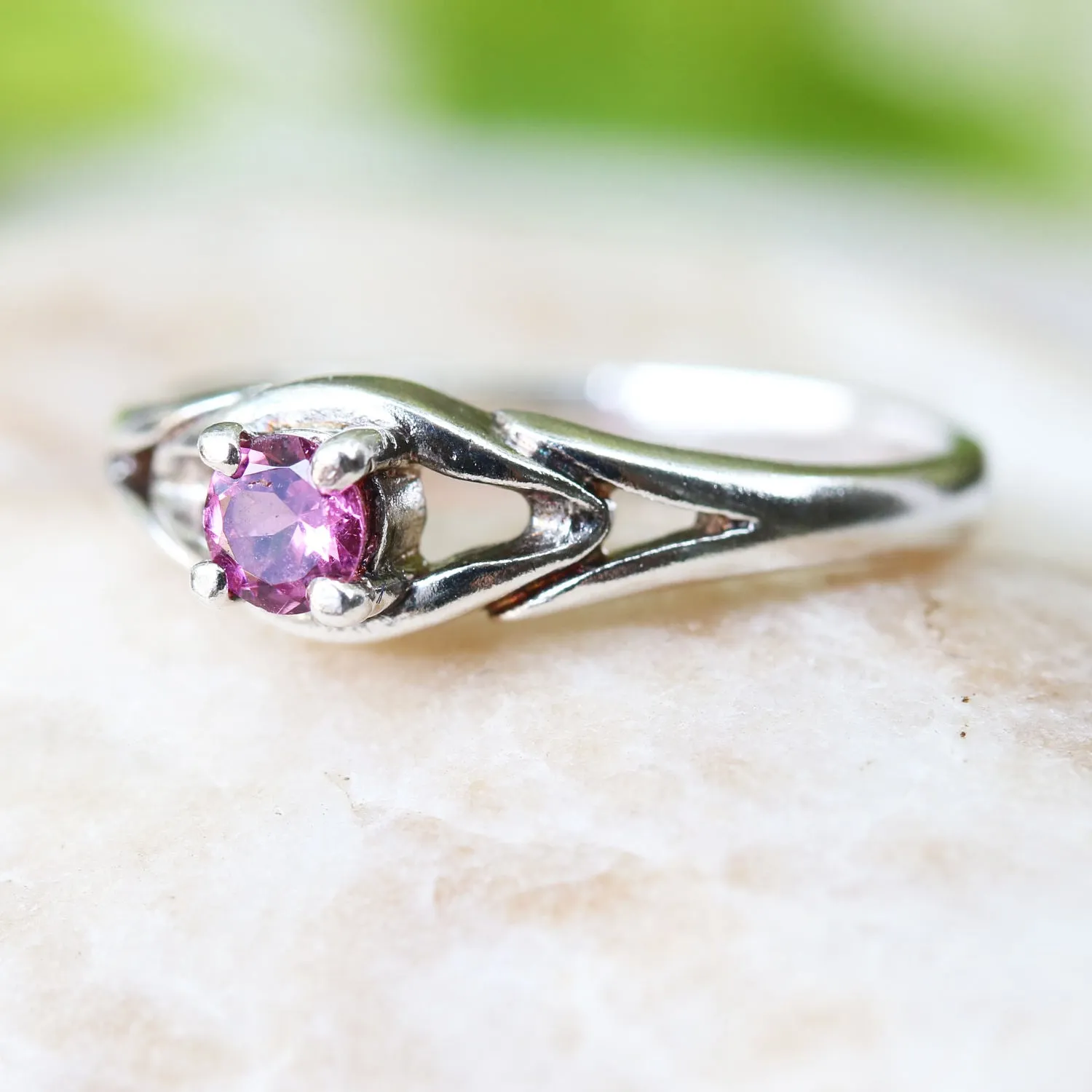Faceted pink tourmaline gemstone ring with sterling silver band