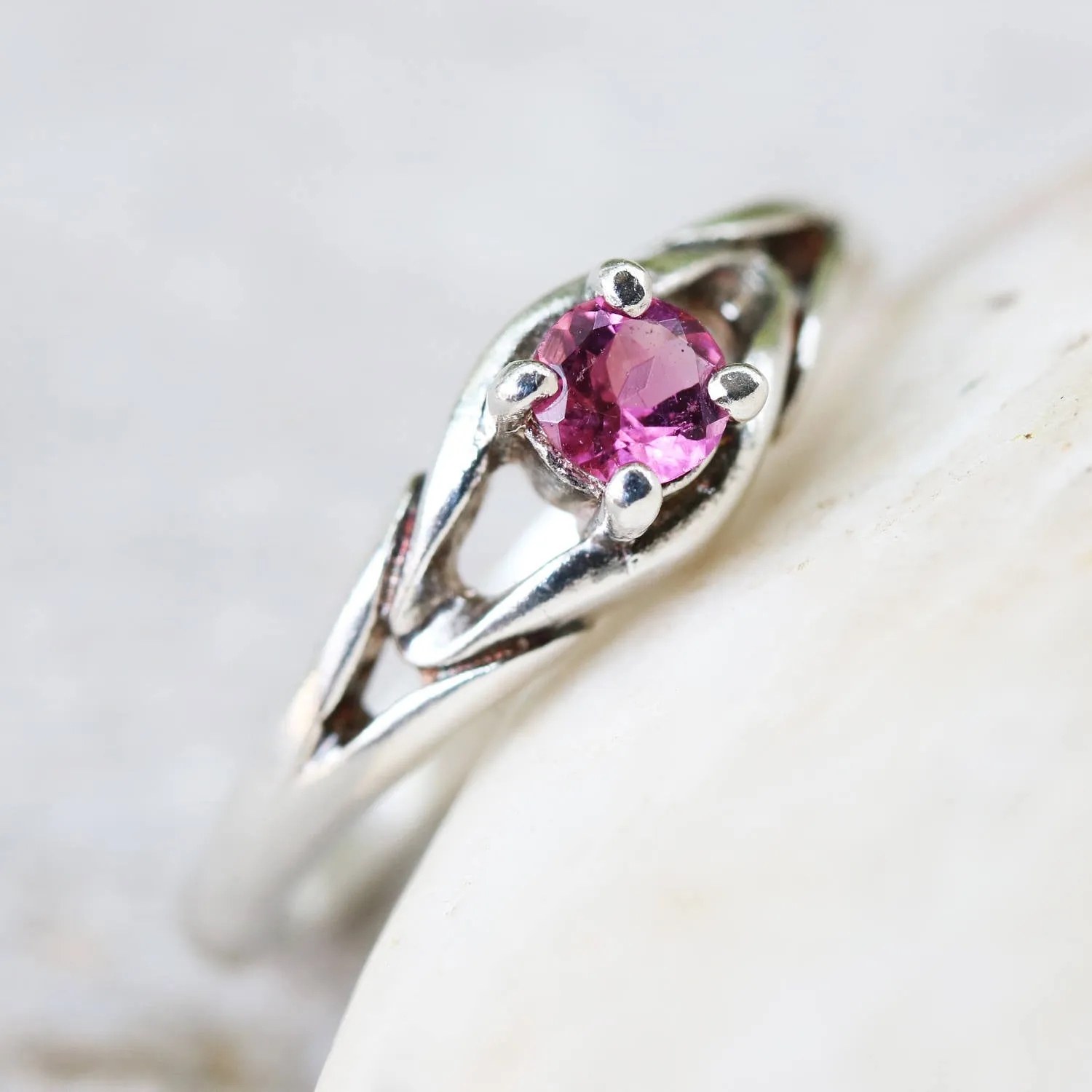 Faceted pink tourmaline gemstone ring with sterling silver band