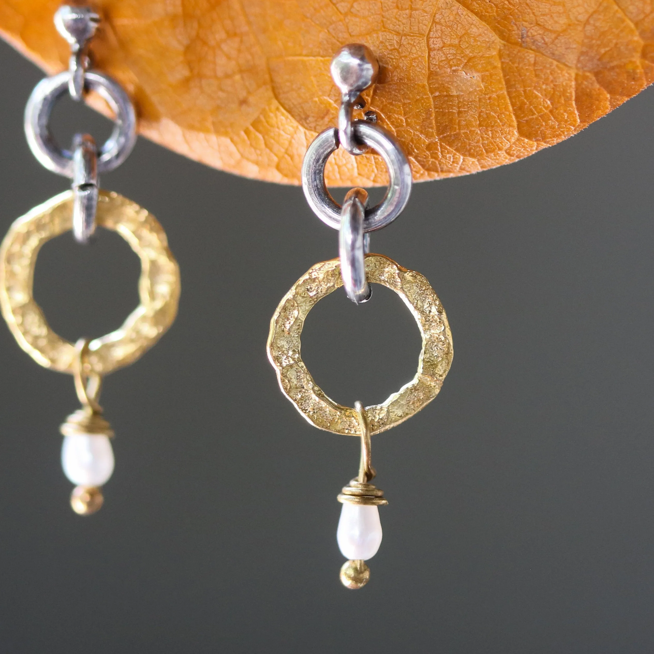 Gold plated silver hoop earrings with pearl accents and sterling silver stud style