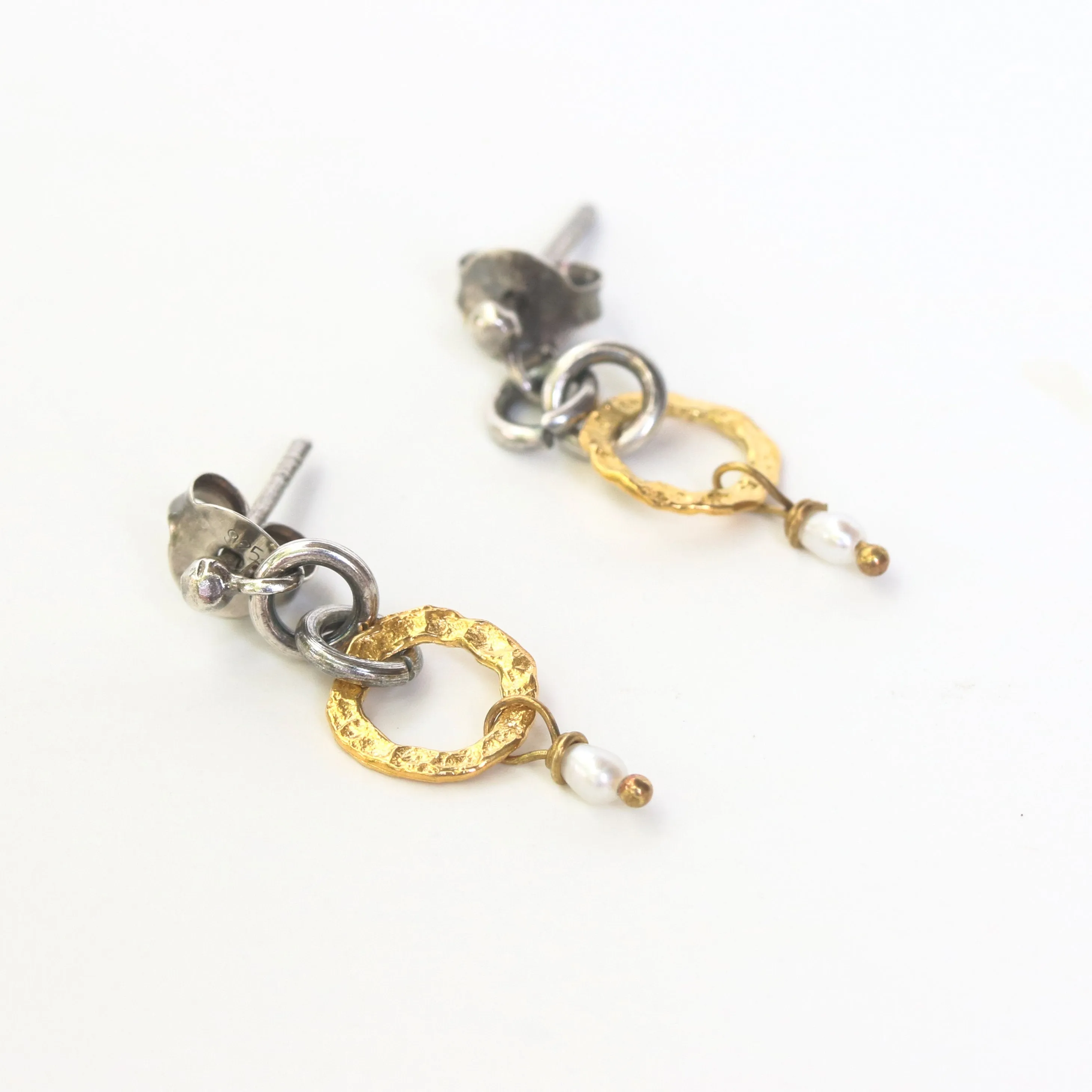 Gold plated silver hoop earrings with pearl accents and sterling silver stud style