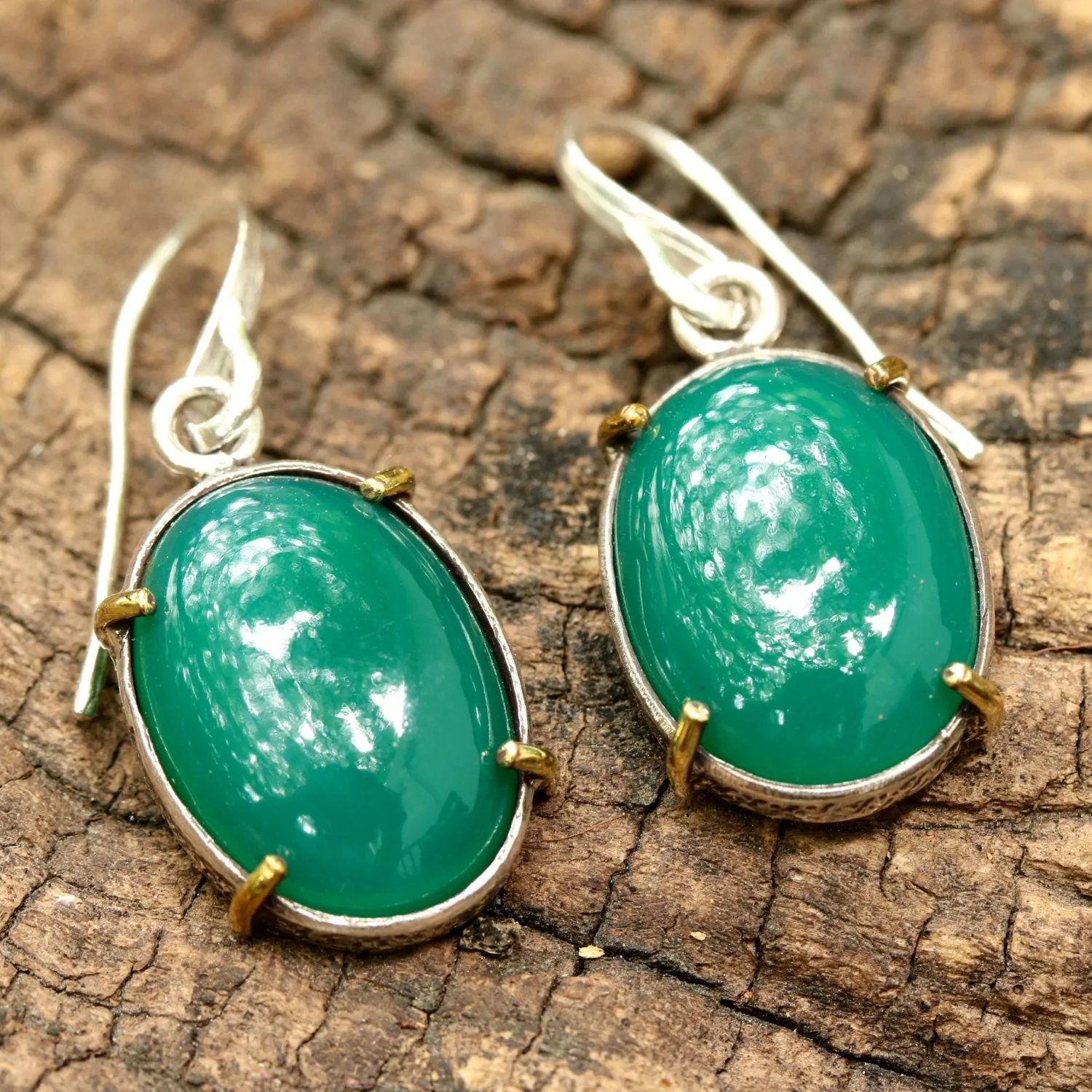 Green onyx cabochon earrings in silver bezel setting with polished brass accent prongs