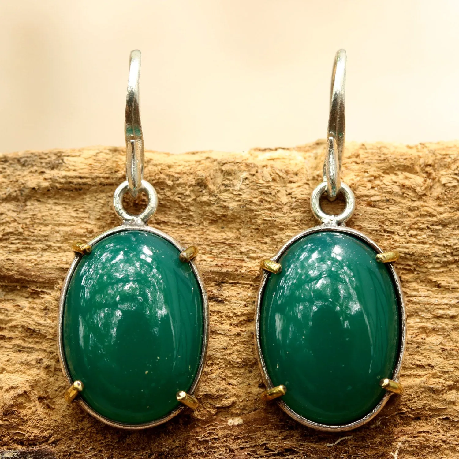 Green onyx cabochon earrings in silver bezel setting with polished brass accent prongs
