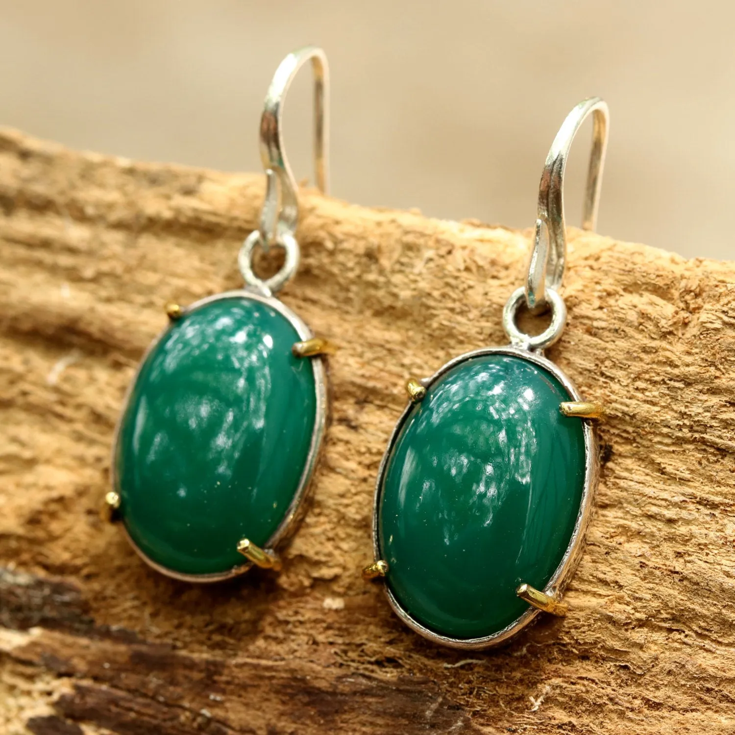 Green onyx cabochon earrings in silver bezel setting with polished brass accent prongs