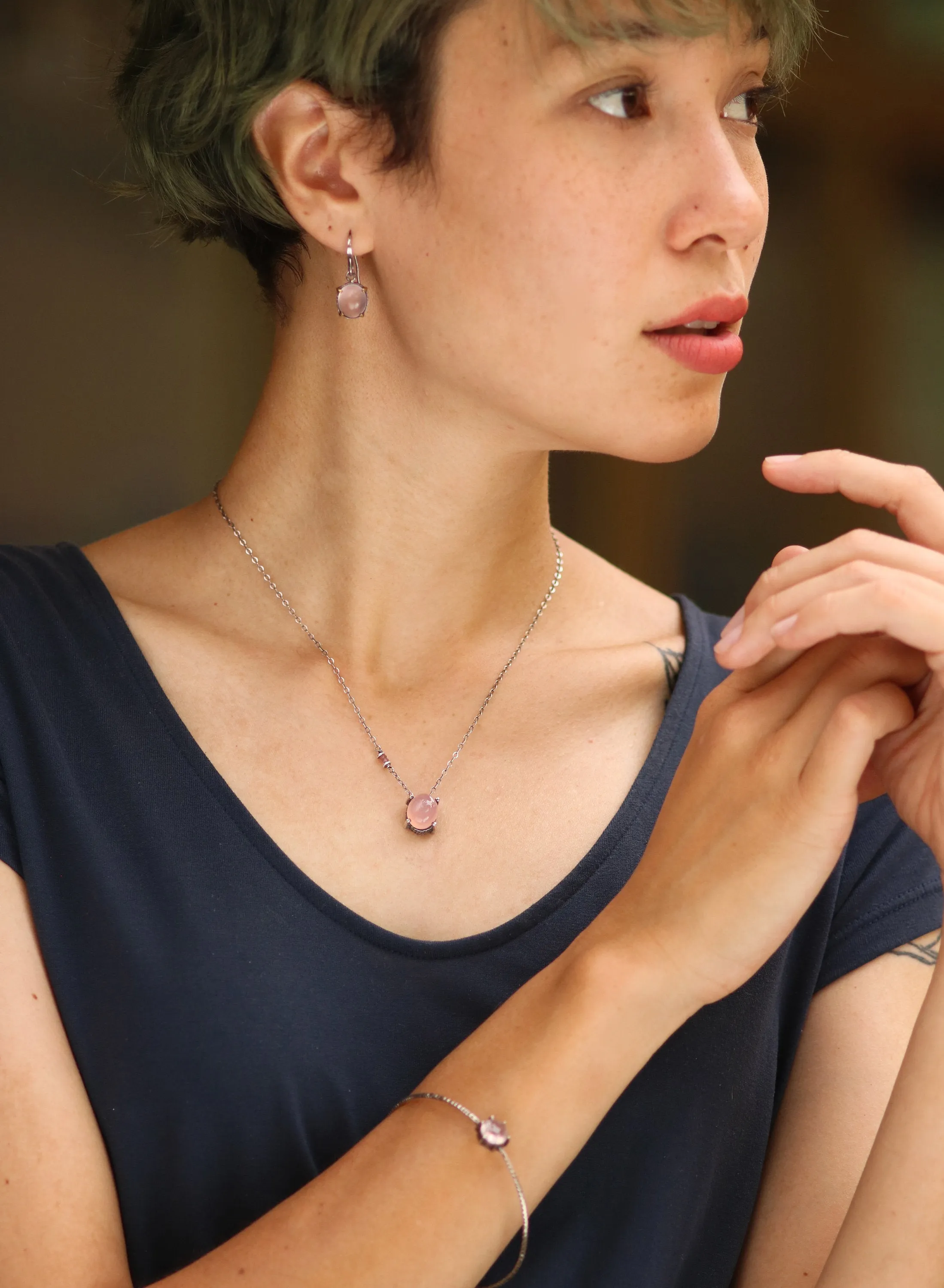 Oval cabochon rose quartz necklace in silver bezel and prongs setting with pink multi-sapphire beads secondary on oxidized silver chain