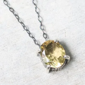 Oval faceted Citrine pendant necklace in silver bezel and prongs setting with yellow multi-sapphire beads secondary on silver chain