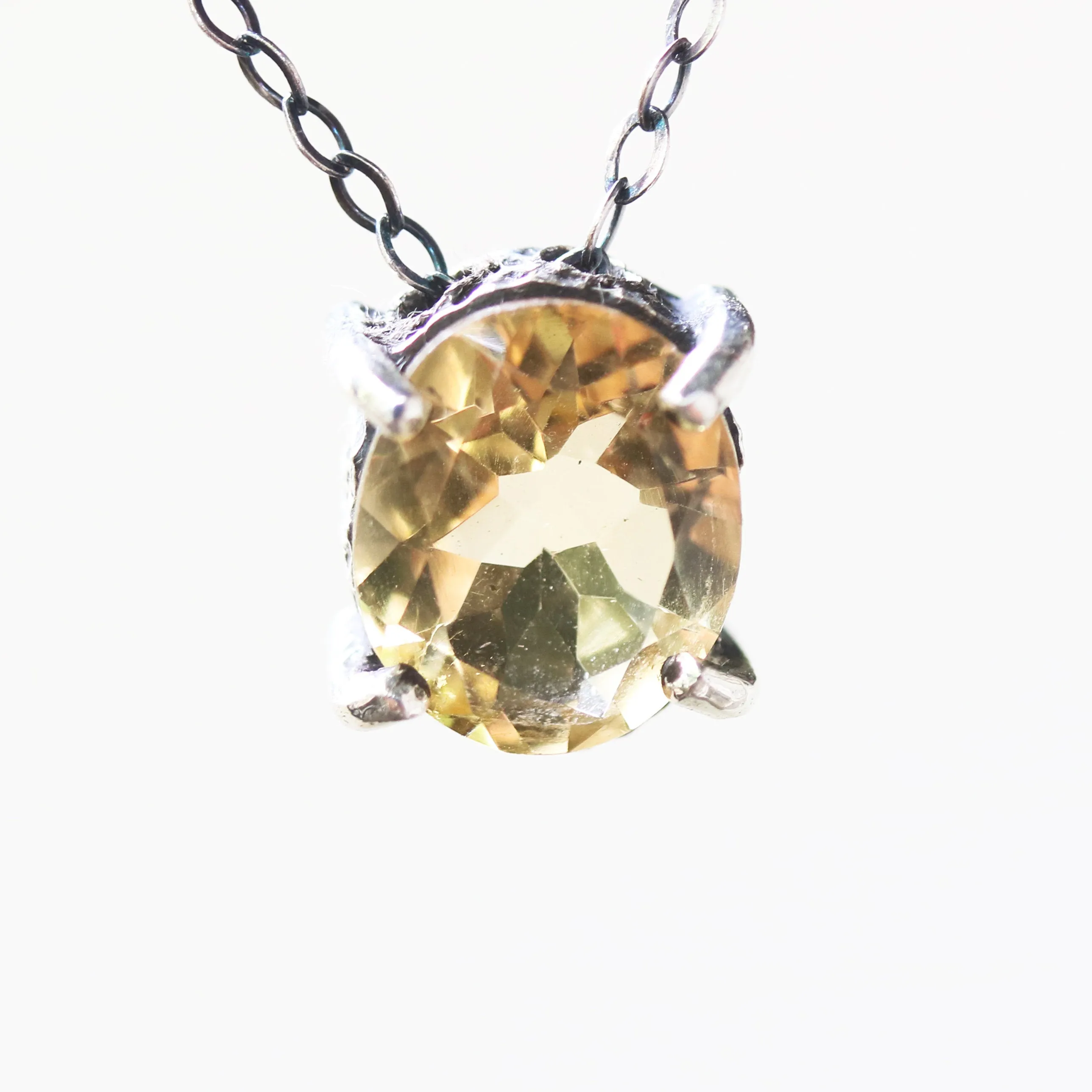 Oval faceted Citrine pendant necklace in silver bezel and prongs setting with yellow multi-sapphire beads secondary on silver chain