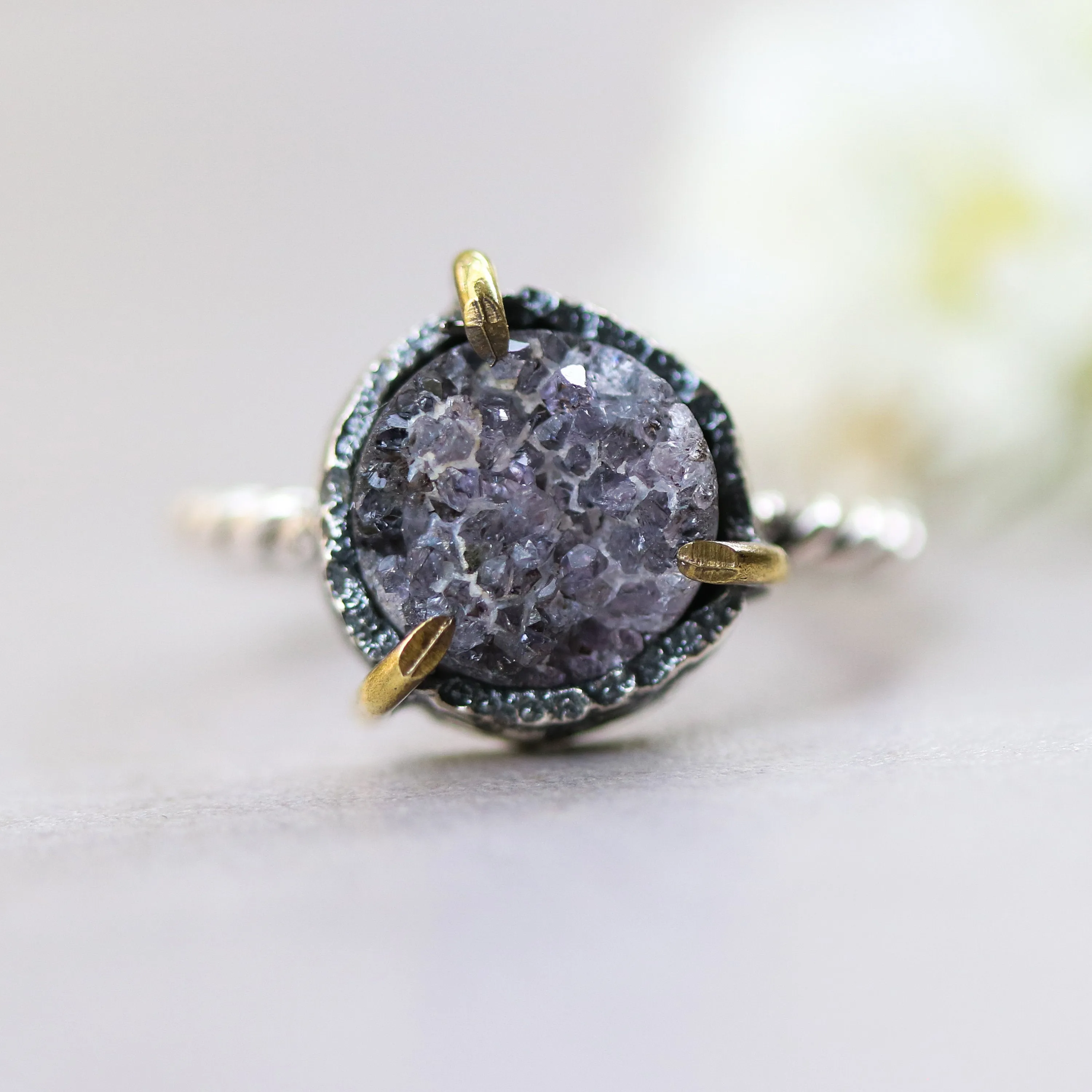Purple round druzy quartz ring in silver bezel and brass prongs setting with oxidized sterling silver twist design band