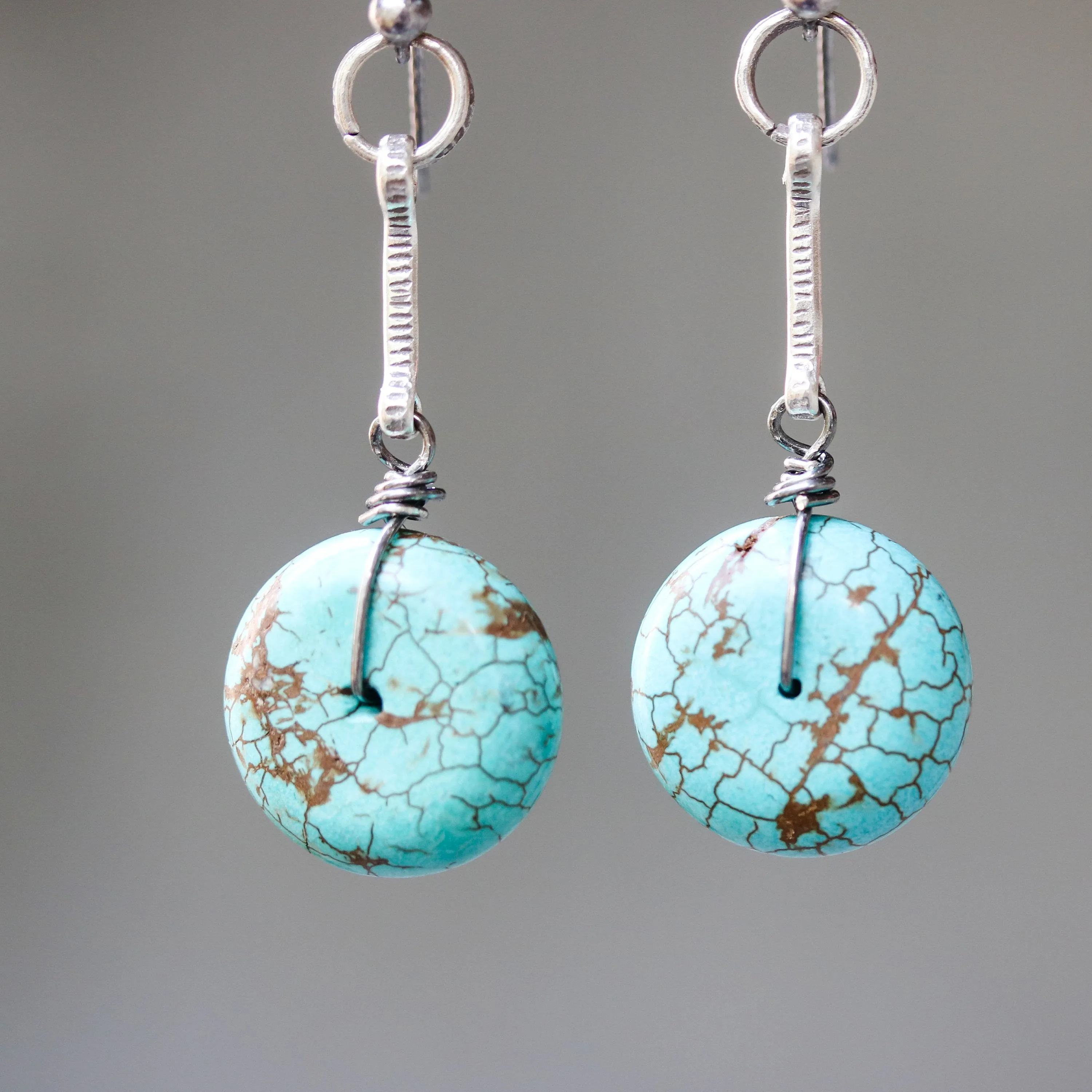 Round blue dyed howlite  earrings with oxidized silver bar on sterling silver hooks style