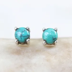 Sterling silver stud earrings with cabochon turquoise in prongs setting with sterling silver post and backing