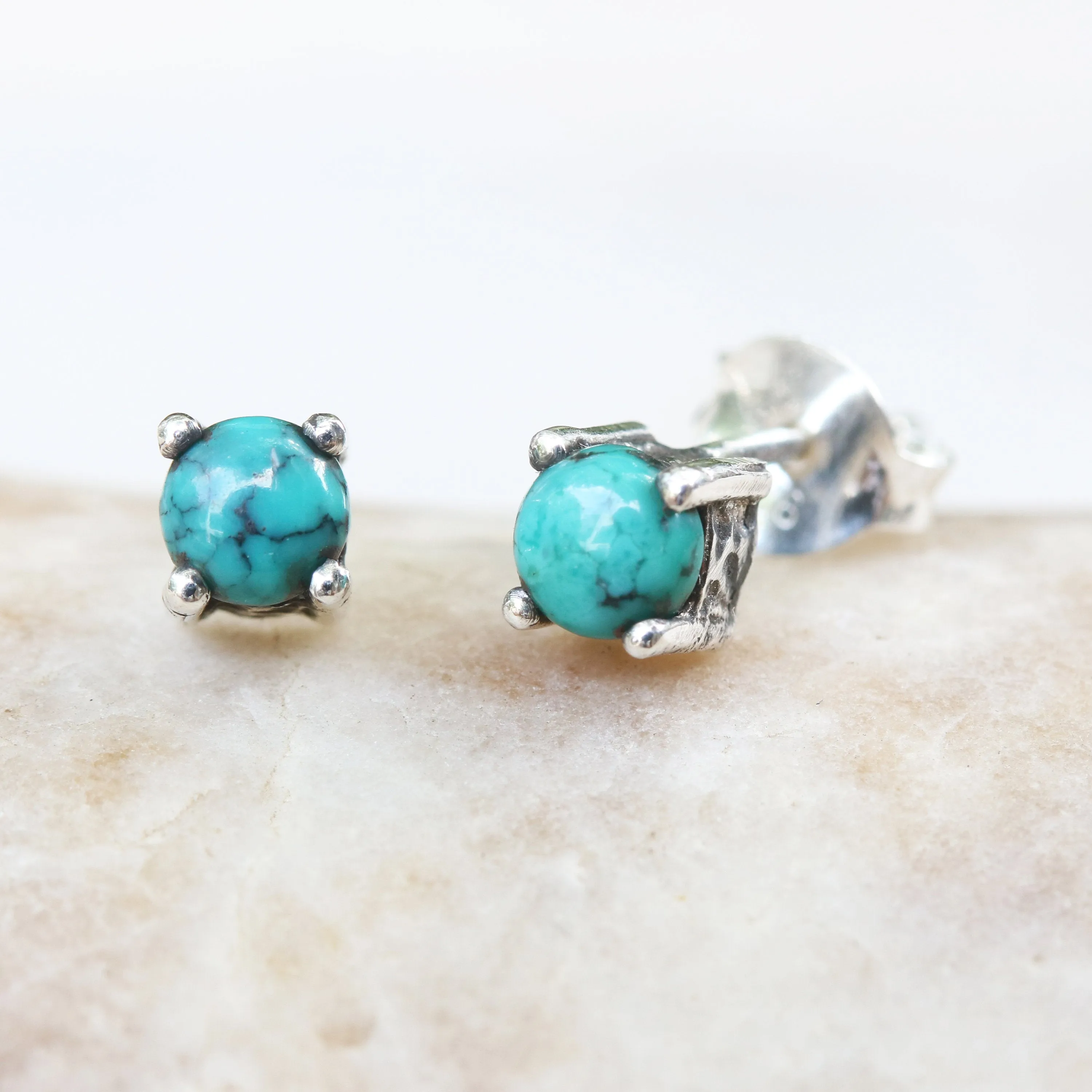 Sterling silver stud earrings with cabochon turquoise in prongs setting with sterling silver post and backing