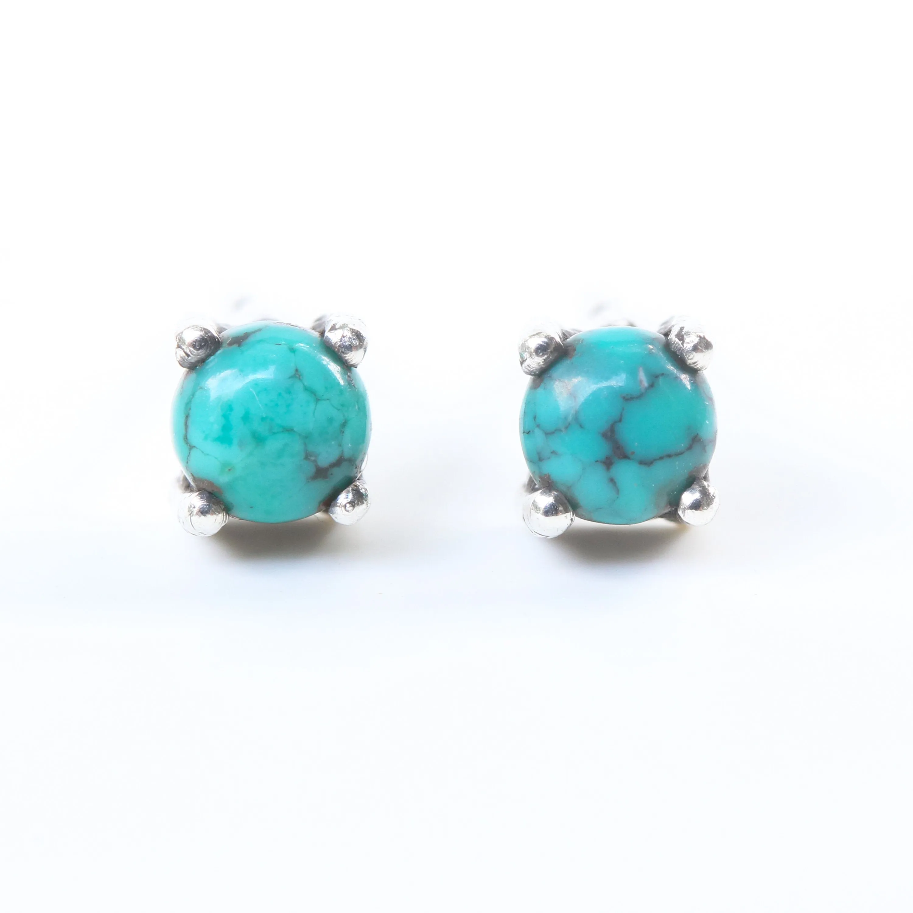 Sterling silver stud earrings with cabochon turquoise in prongs setting with sterling silver post and backing