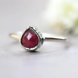 Teardrop ruby ring in silver bezel setting with sterling silver high polish finished band