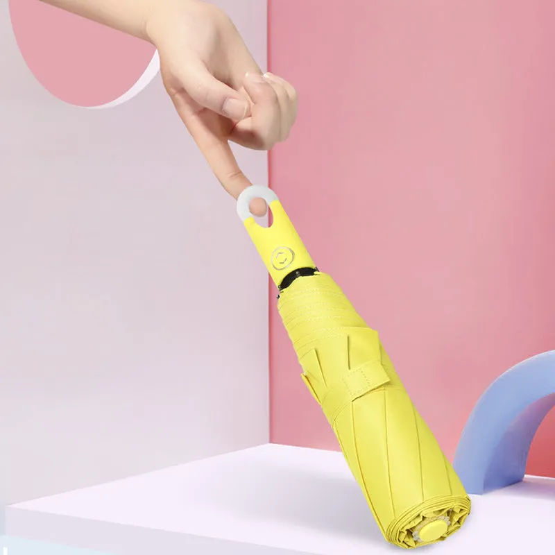 Three-fold self opening and retracting umbrella with buckle