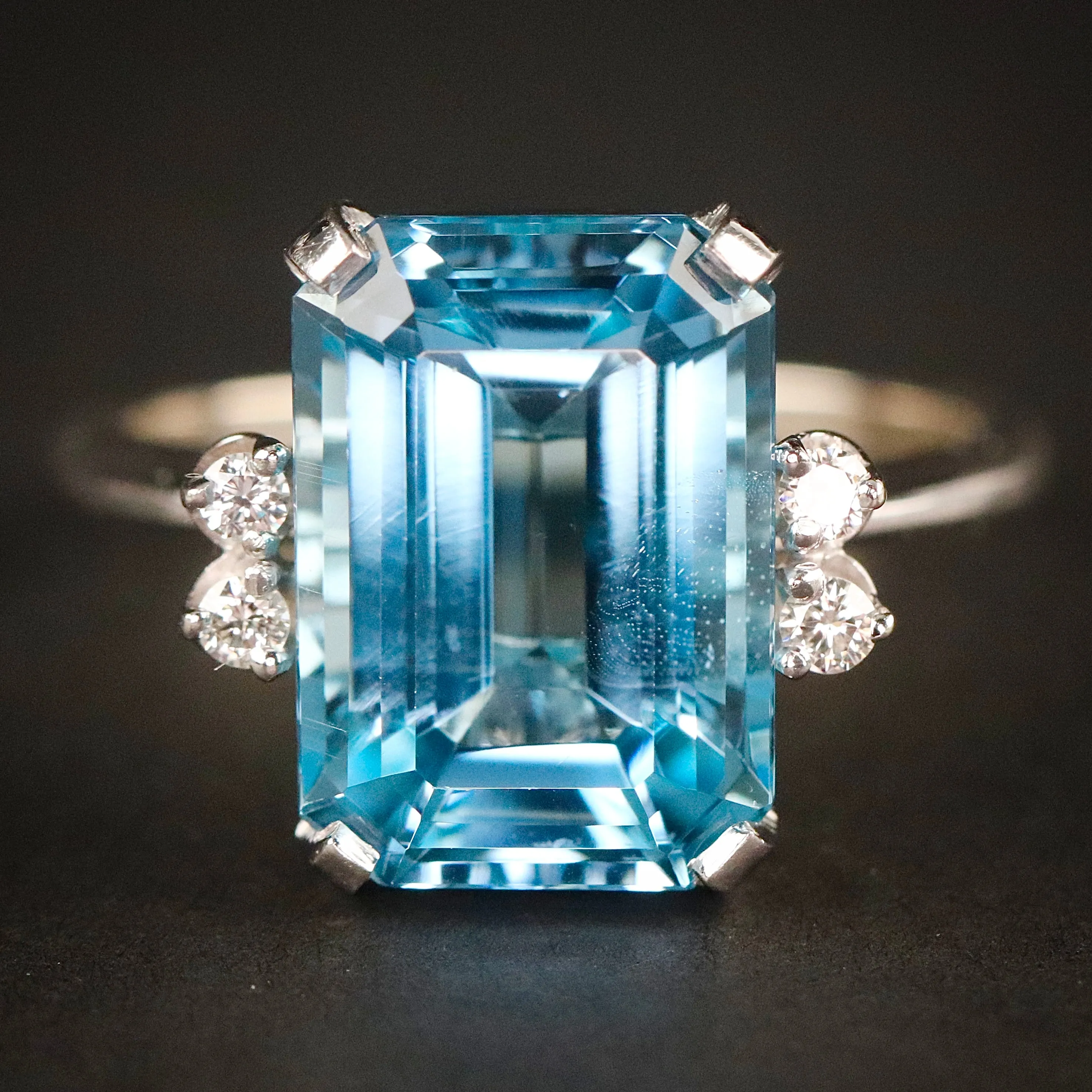 Vintage Emerald cut blue topaz and diamond ring in 14k white gold