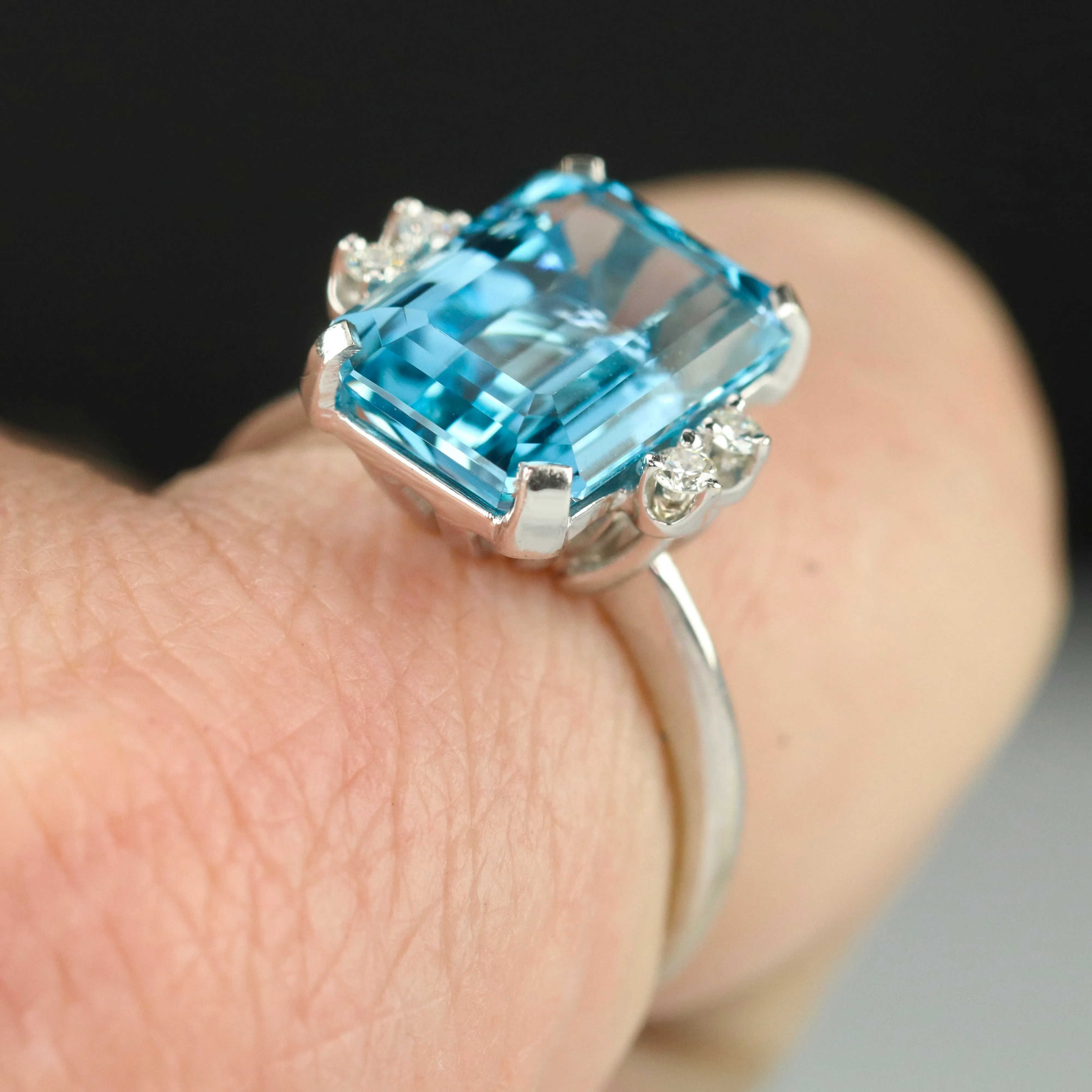 Vintage Emerald cut blue topaz and diamond ring in 14k white gold