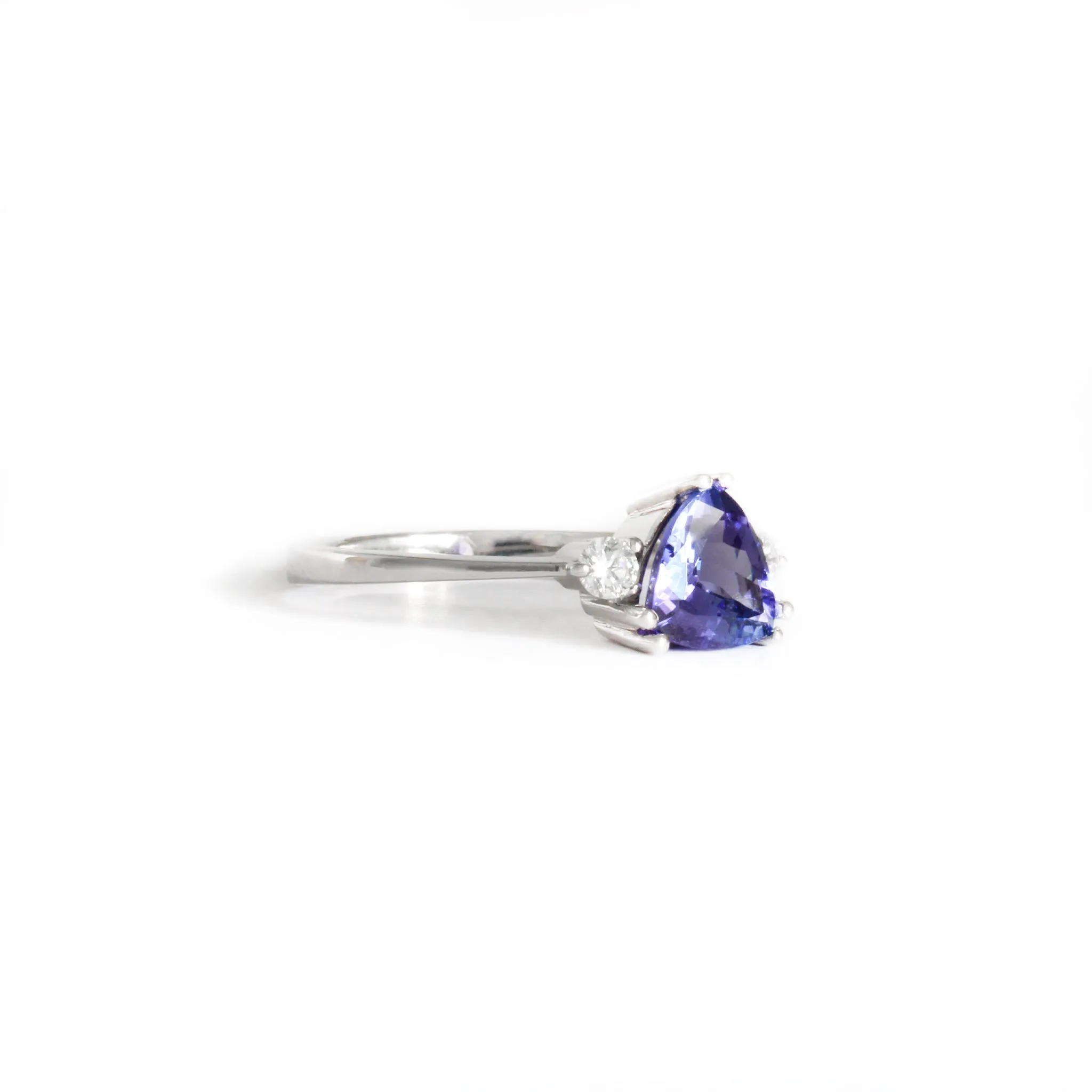 White Gold Double Claw Trilliant Cut Tanzanite With Diamond Shoulder Highlight Ring